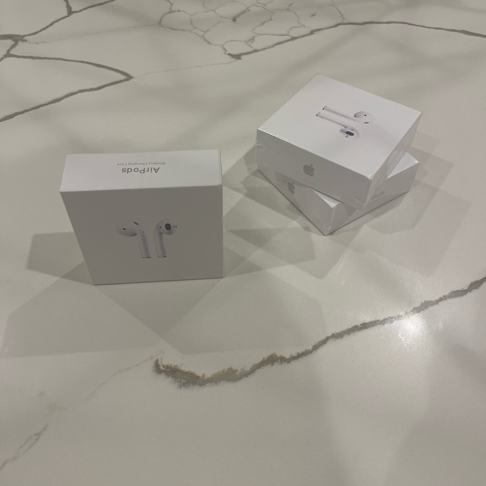 Apple AirPods with Charging Case - White